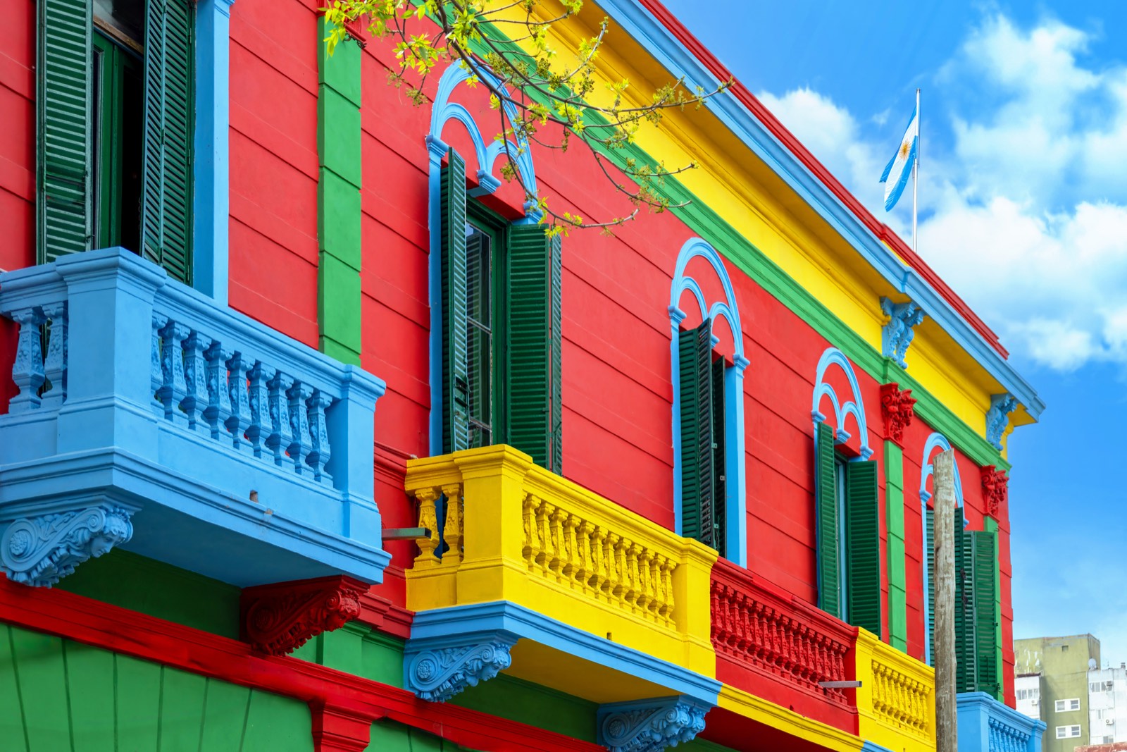 Painted balconies and shutters on a house in La Boca, Buenos Aires